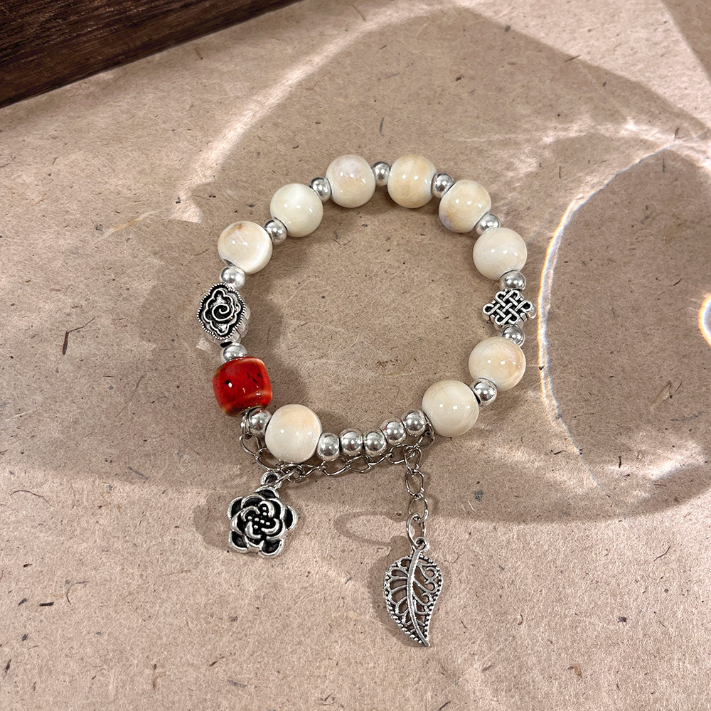 سوار خزفي بخرز على الطراز الصي - مراجعة Ceramic Link Bracelet وسعره